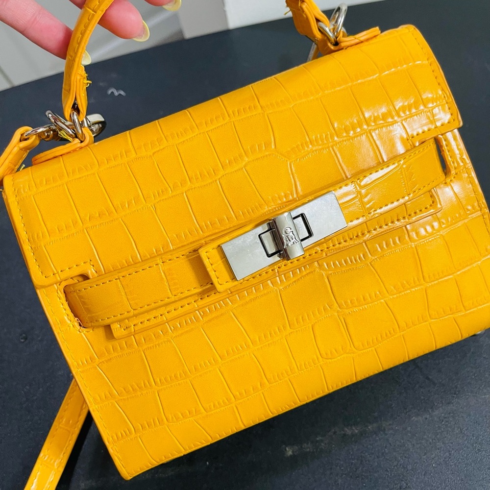 Small cute bag, yellow and silver.